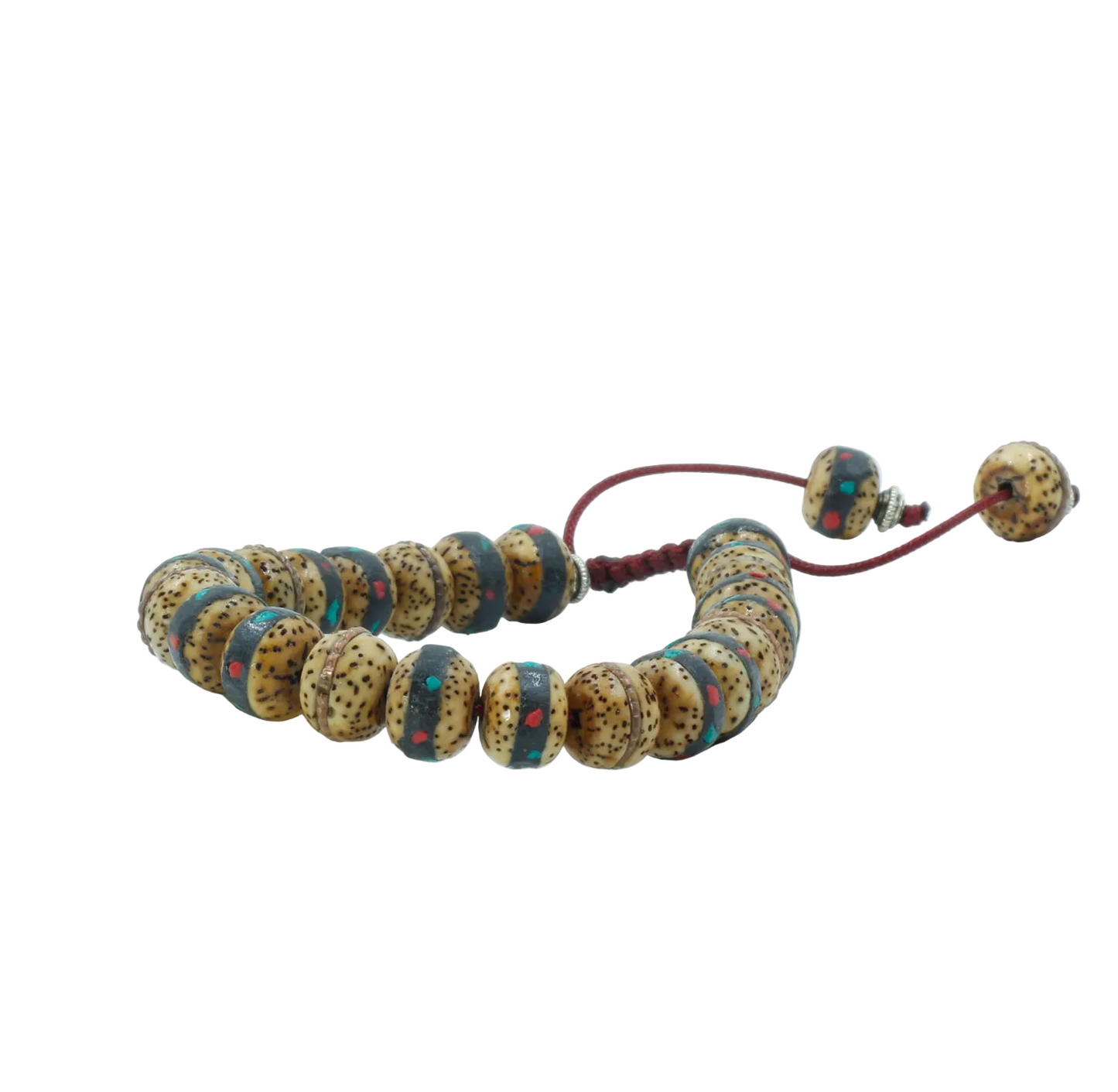 Beaded mala bracelet with speckled beads on a white background