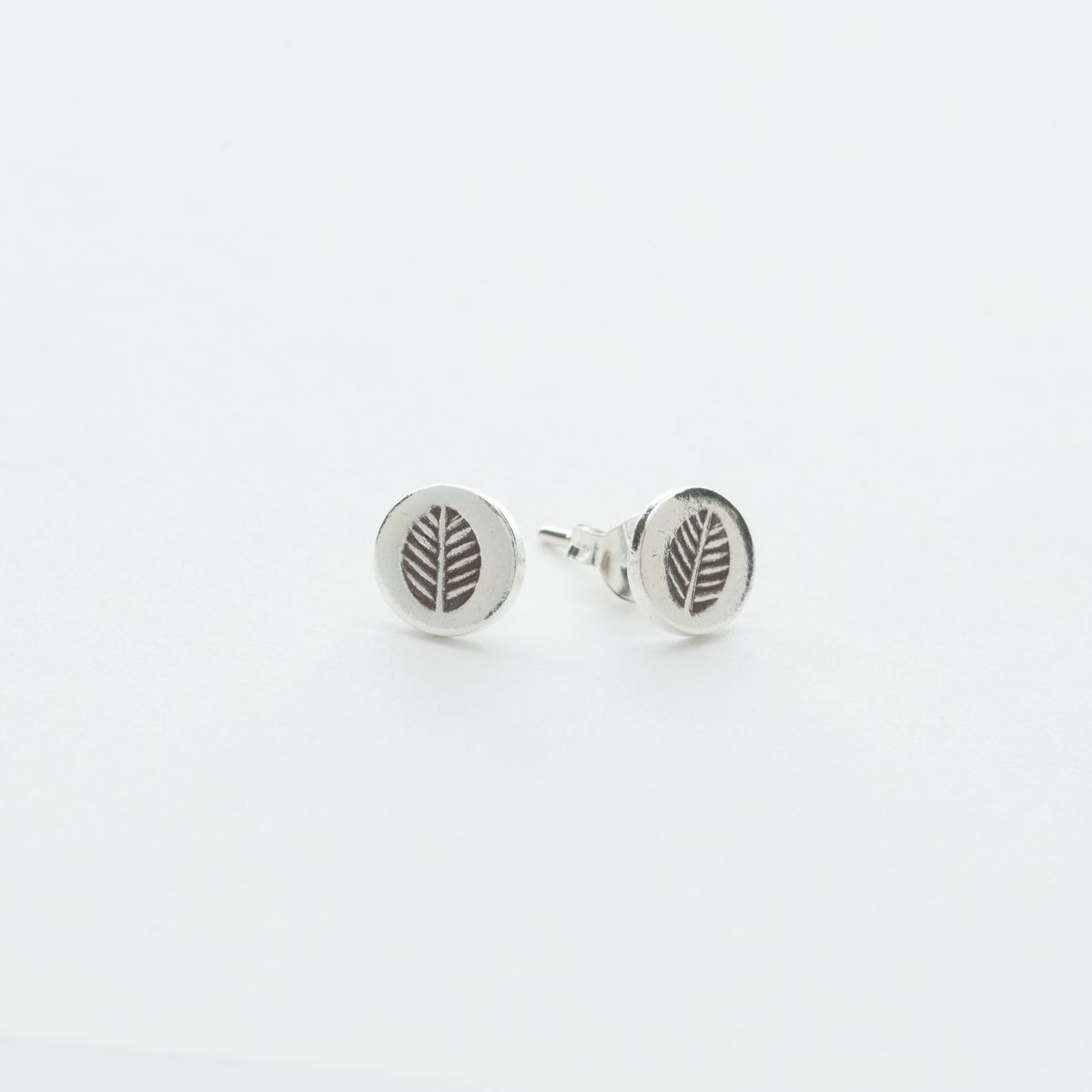 Tiny Round Bodhi Leaf Stud Earrings in Sterling Silver