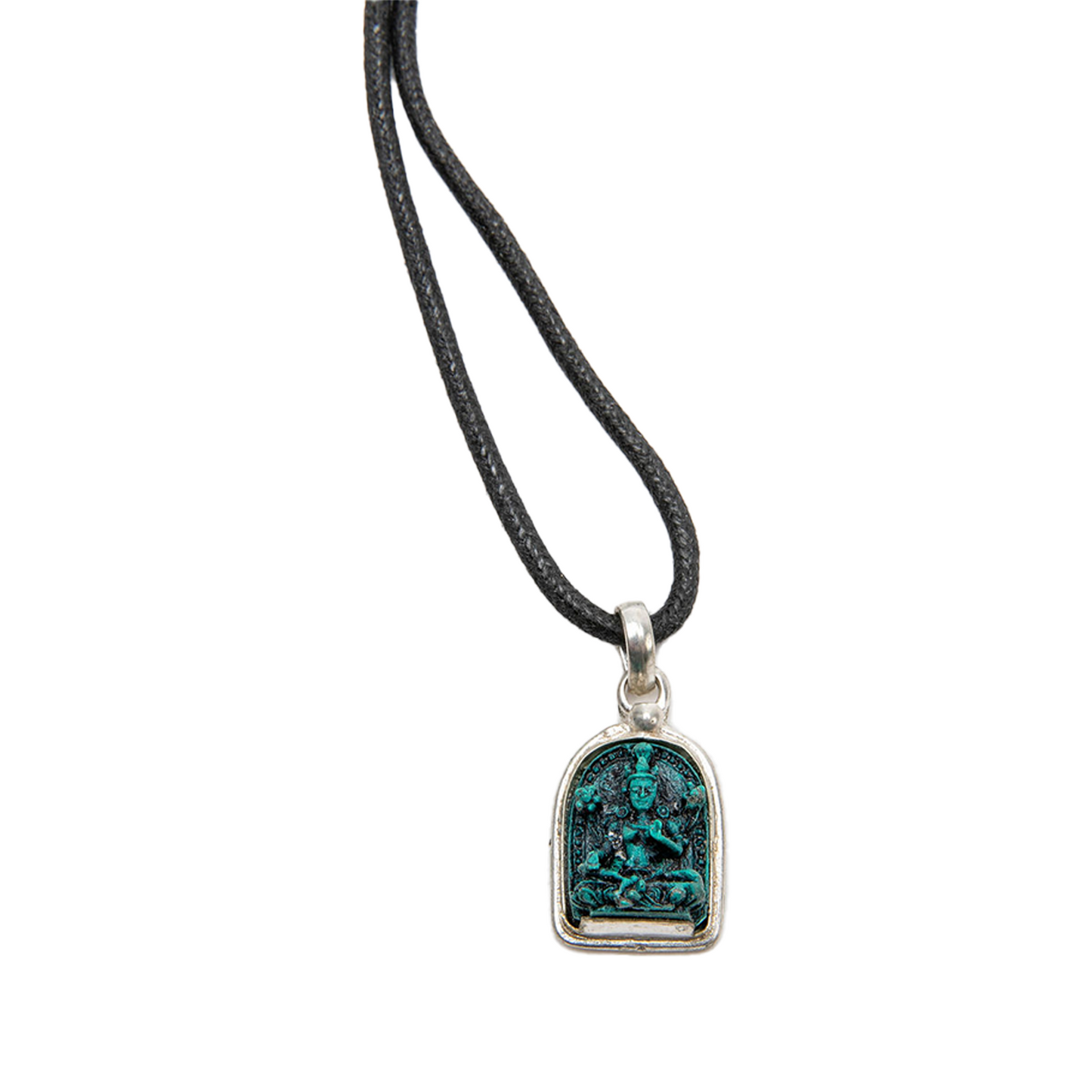 Close-up of Green Tara Pendant on a solid white backdrop.
