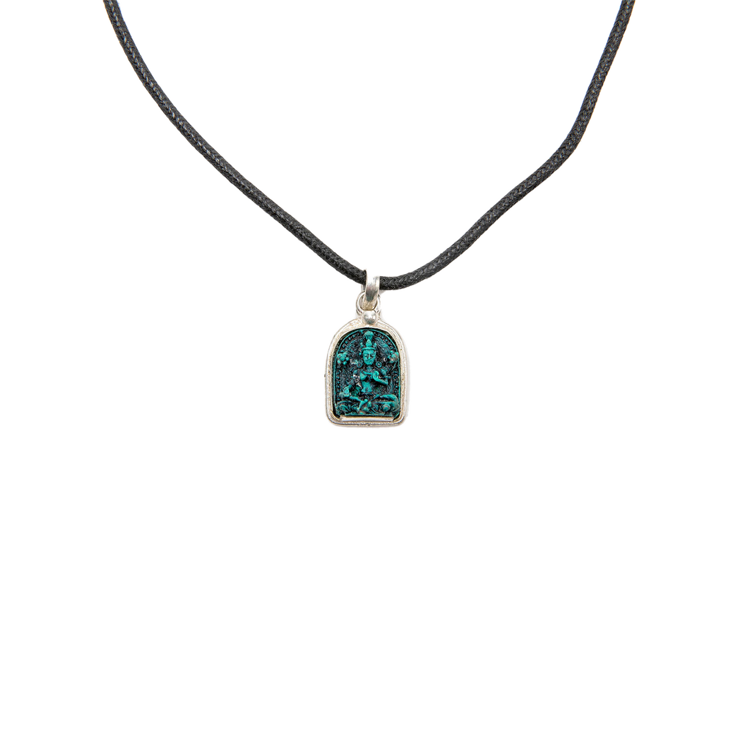 Close-up of Green Tara Pendant on a solid white backdrop.