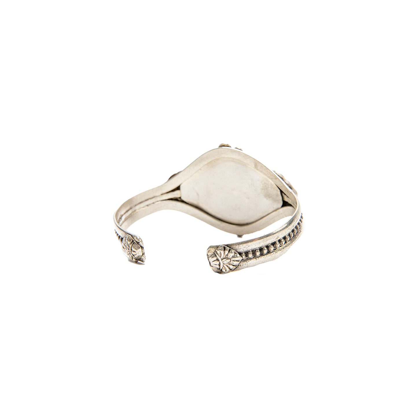 Back angle of Green Tara Cuff Bracelet on a white backdrop.