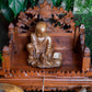 Wooden 'May All Beings Be Free' Statue