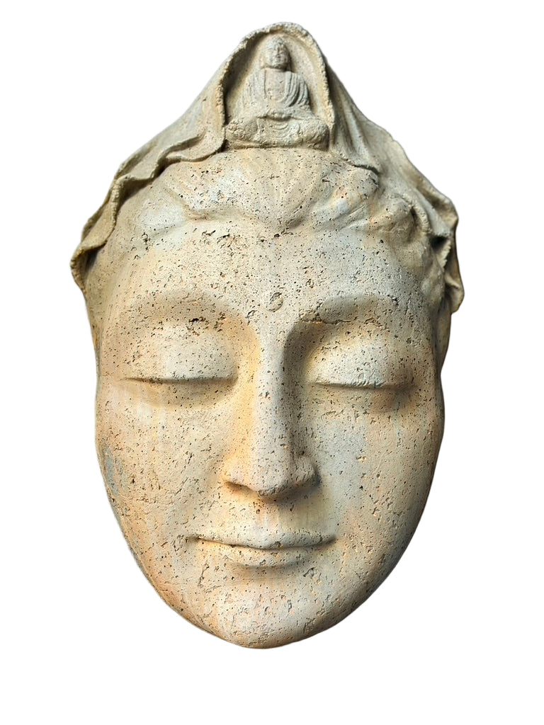 Stone sculpture of a Kwan Yin with a draped garment on a white background