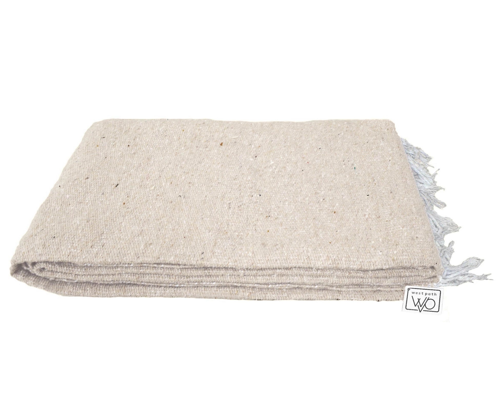 Beige woven blanket with tassels on a white background