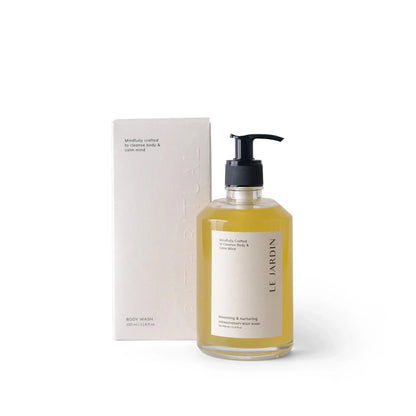 Le Jardin body wash bottle with pump and packaging on a white background