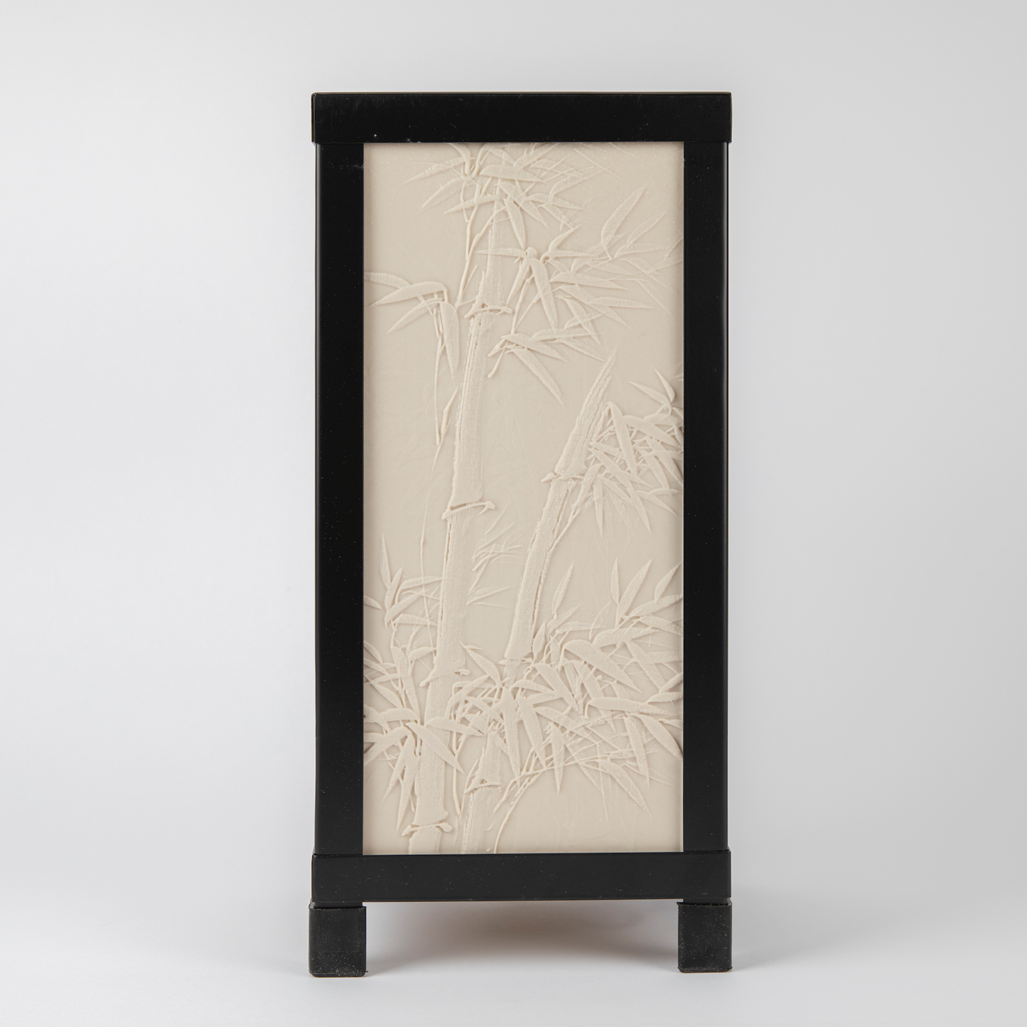Decorative screen with bamboo pattern and black frame on a white background