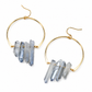 A pair of gold hoop earrings with five clear blue-gray crystal points hanging from each hoop, shown on a plain white background.