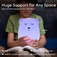A child holds a small glowing bear-shaped night light in their hands while reading a book. The image includes text overlays showing the dimensions of the light as 6.