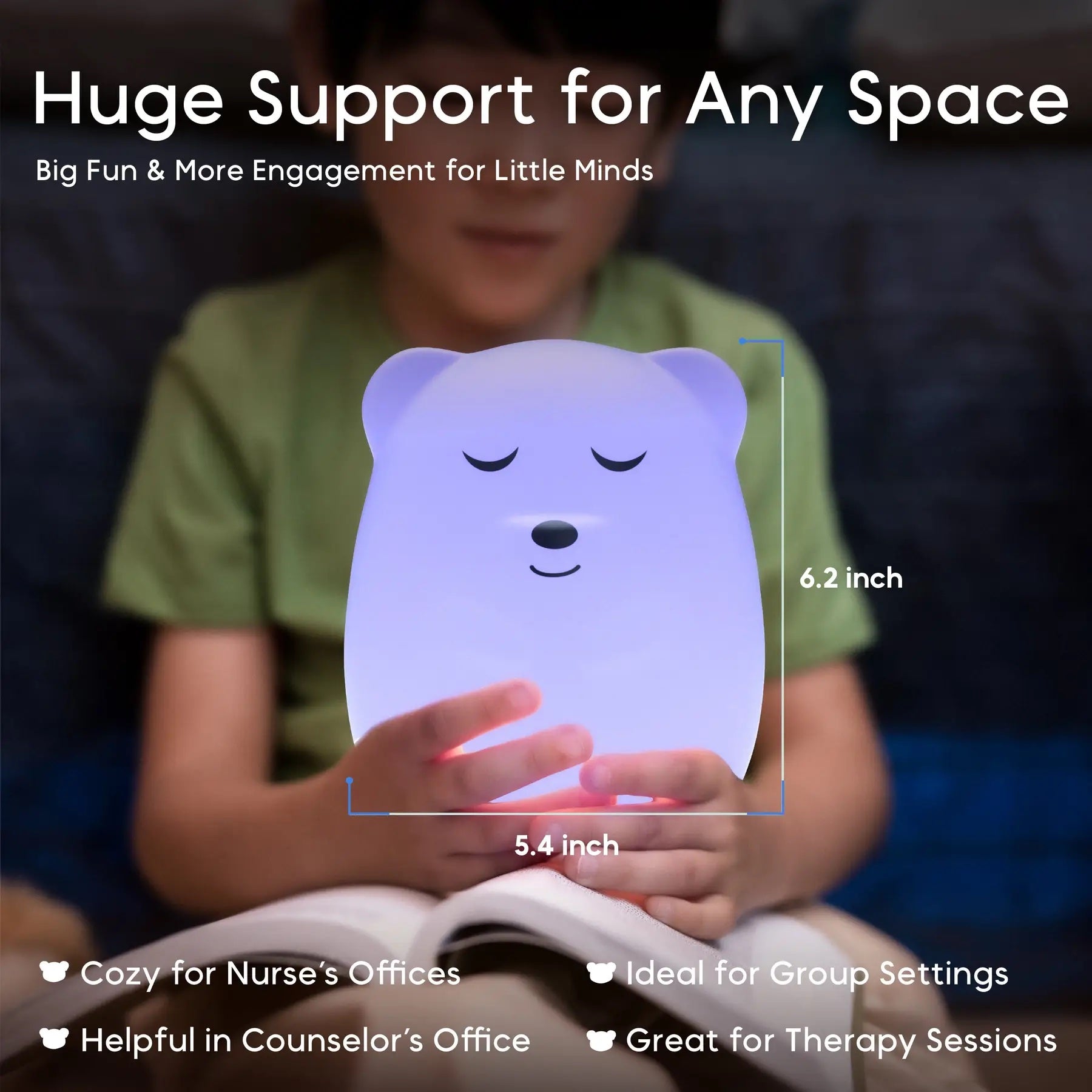 A child holds a small glowing bear-shaped night light in their hands while reading a book. The image includes text overlays showing the dimensions of the light as 6.