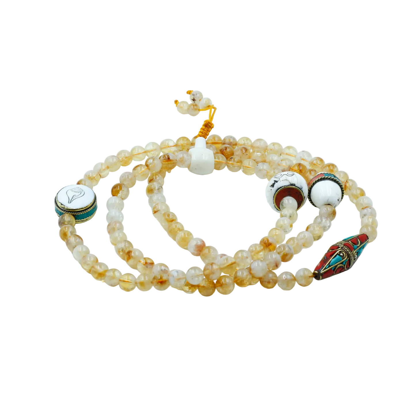 Beaded mala with decorative elements on a white background