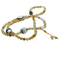 Citrine mala with decorative elements on a white background