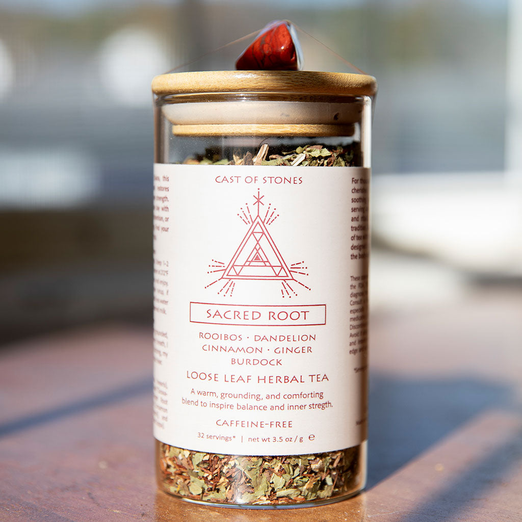 Herbal tea packaging with visible brand and product details on a blurred background