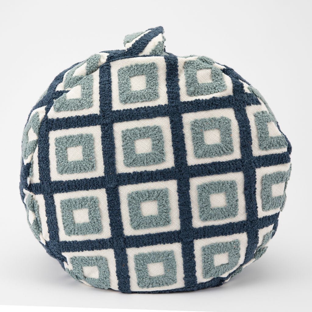 Round pillow with geometric pattern on a white background