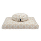 Beige and white patterned pet bed with a matching pillow on a white background