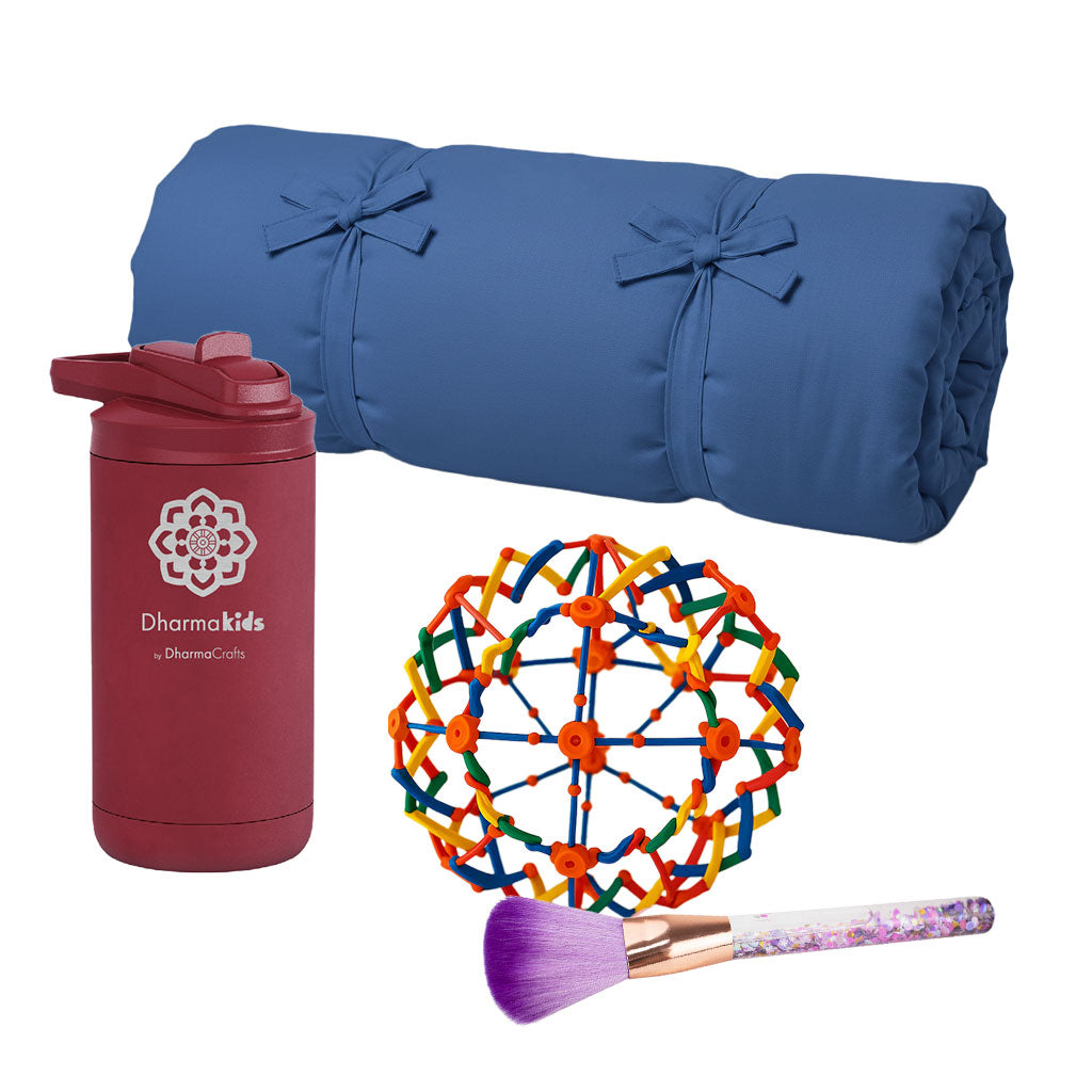 Blue rolled-up yoga mat, maroon tumbler with logo, colorful ball, and makeup brush on a white background