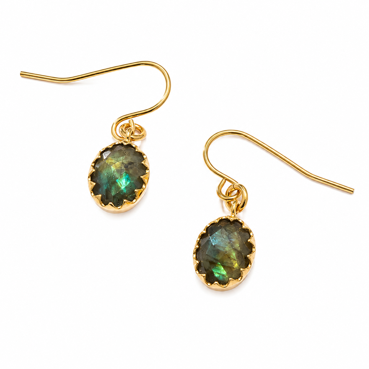 A pair of gold dangle earrings with oval iridescent green-blue labradorite stones in a scalloped gold bezel setting, shown on a plain white background.