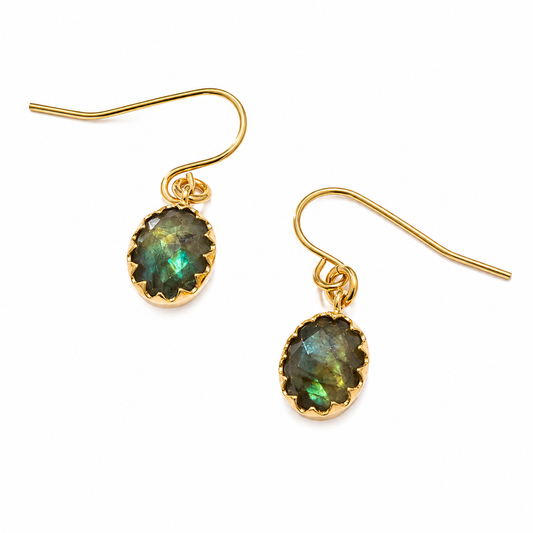 A pair of gold dangle earrings with oval iridescent green-blue labradorite stones in a scalloped gold bezel setting, shown on a plain white background.