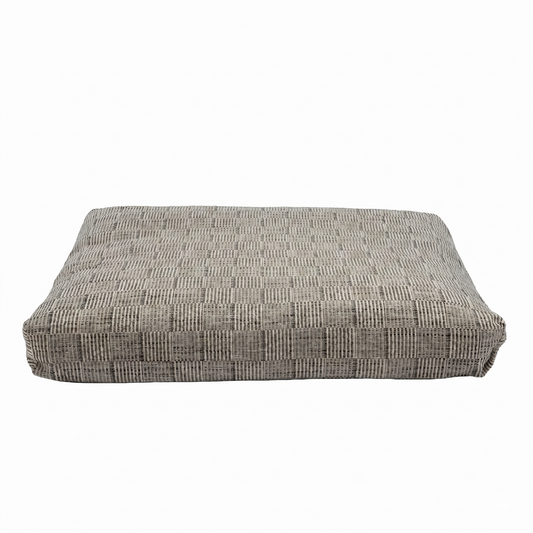 Rectangular zabuton with a textured surface on a white background