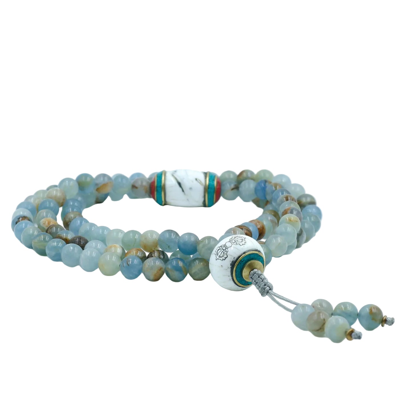 Beaded mala with decorative beads on a white background