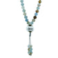 Mala with multicolored beads on a white background