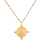 A gold pendant necklace featuring an ornate circular medallion pendant with a central clear gemstone, displayed on a clean white background.