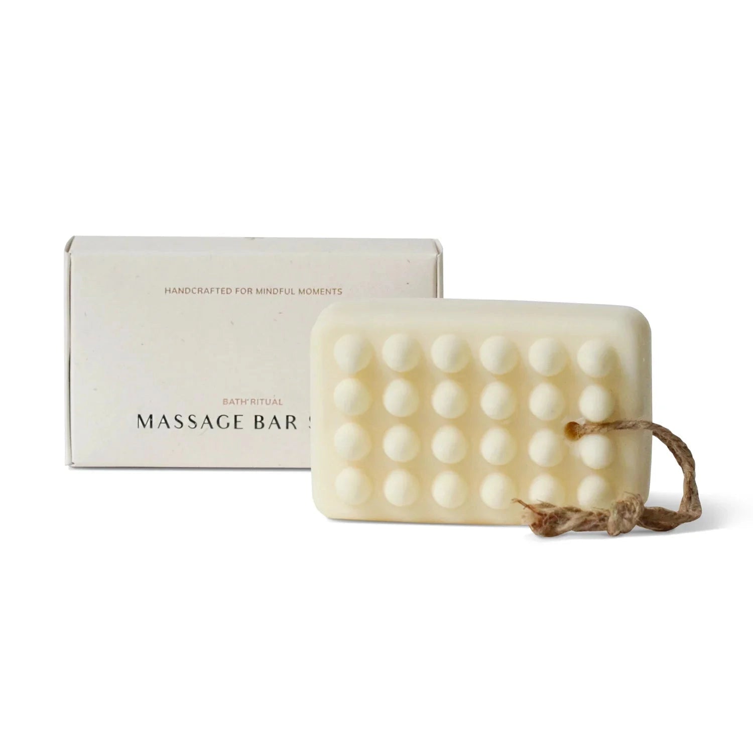 Shea butter massage soap bar with a box on a white background.