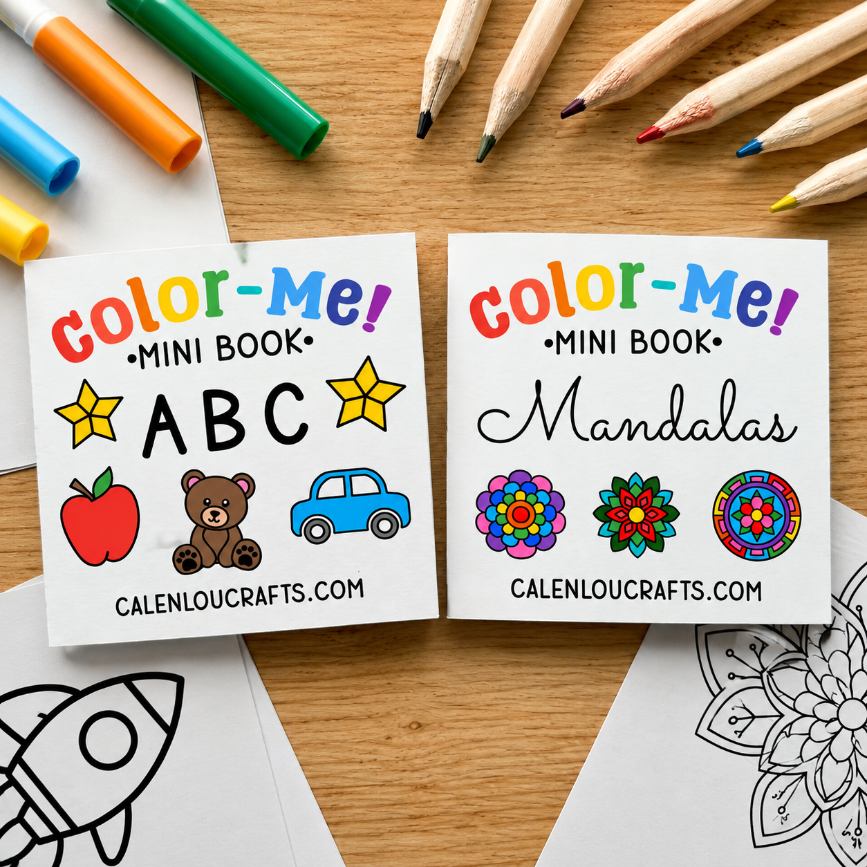 Two small coloring mini books laid on a wooden surface, surrounded by colored pencils and crayons. The left book is titled "Color-Me! Mini Book ABC" with illustrations of a star, letter A, apple, teddy bear, and car.