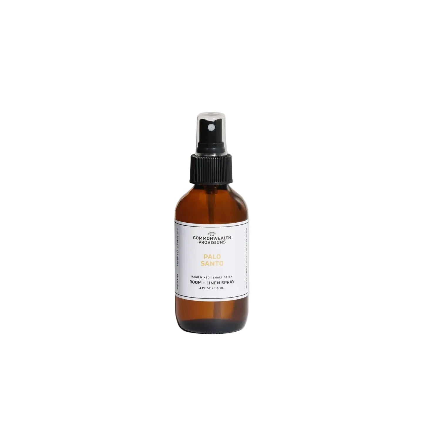 Brown spray bottle with a label on a light gray background