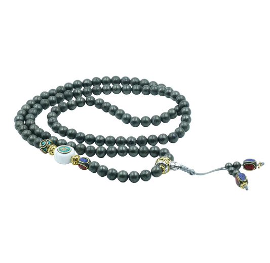 Gray beaded mala necklace with colorful accents on a white background