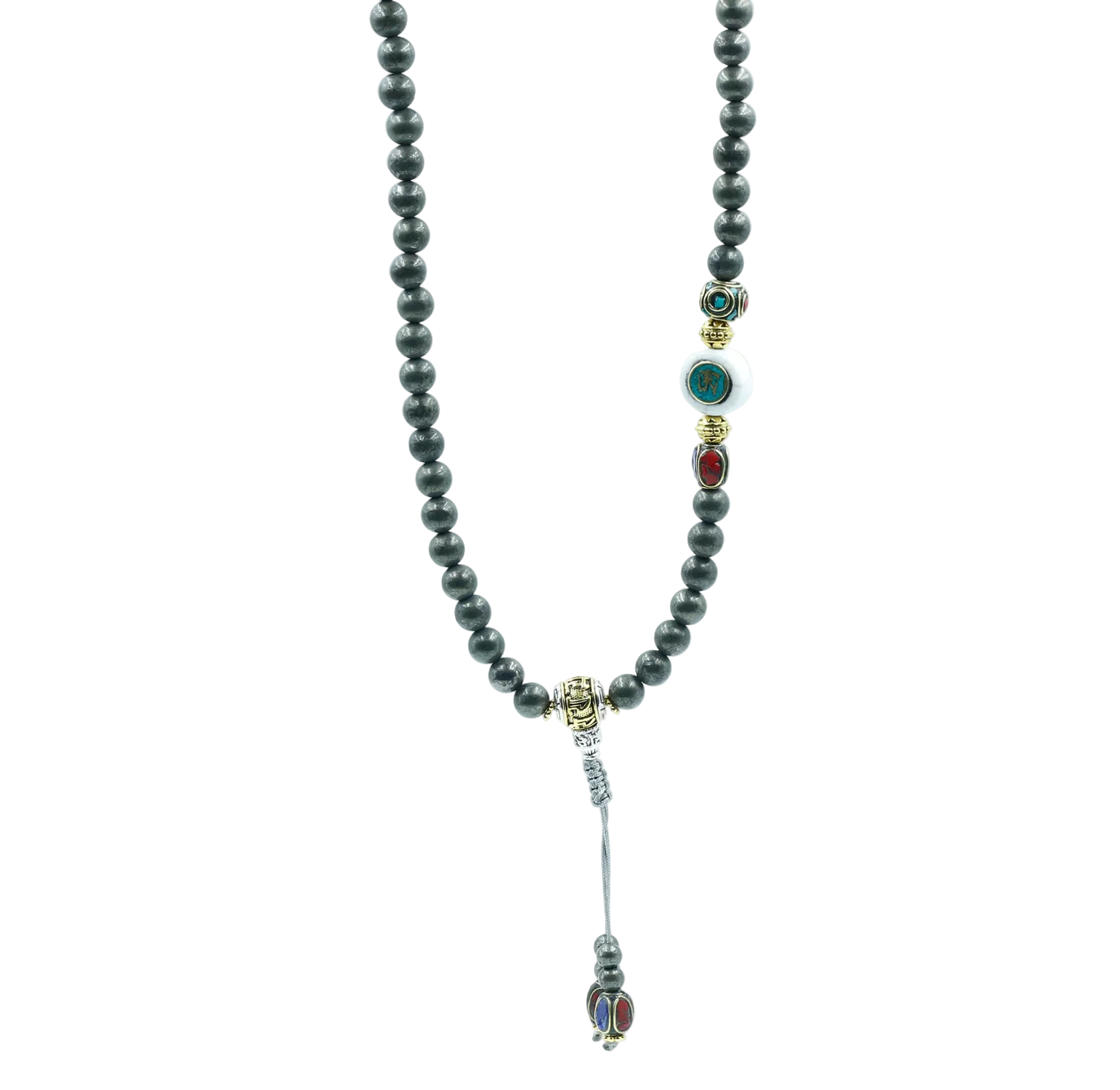 Mala necklace with black beads and colorful pendant on a light gray background