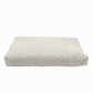 Rectangular cushion with a textured pattern on a white background