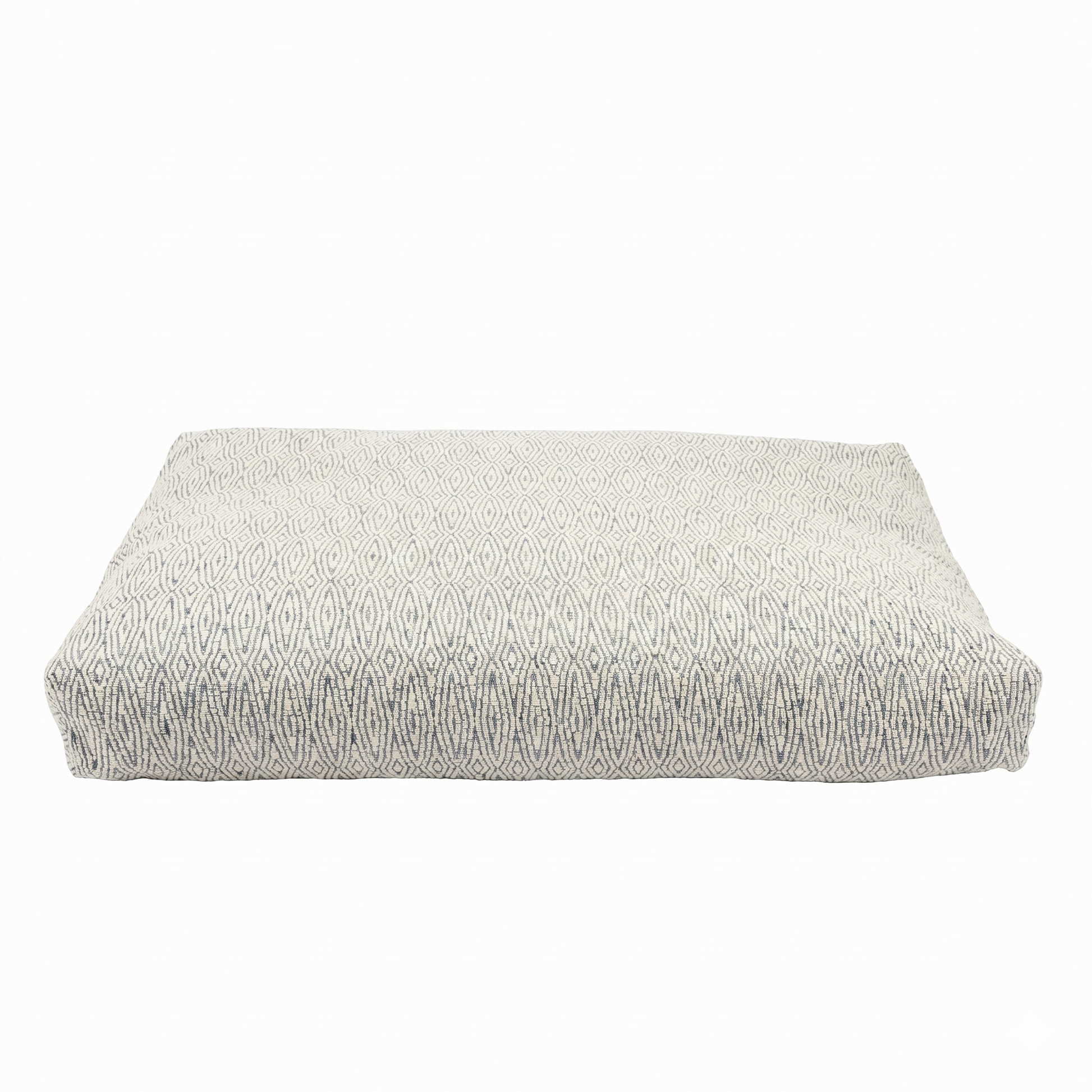 Rectangular cushion with a textured pattern on a white background