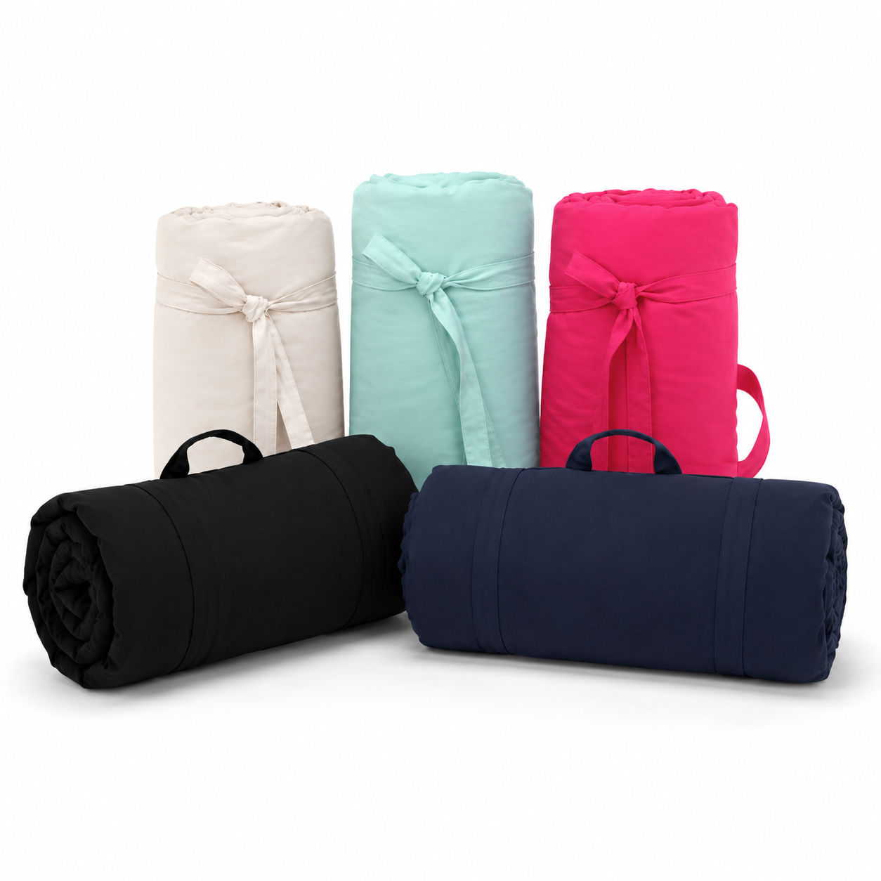 Five rolled-up yoga mats in different colors on a white background