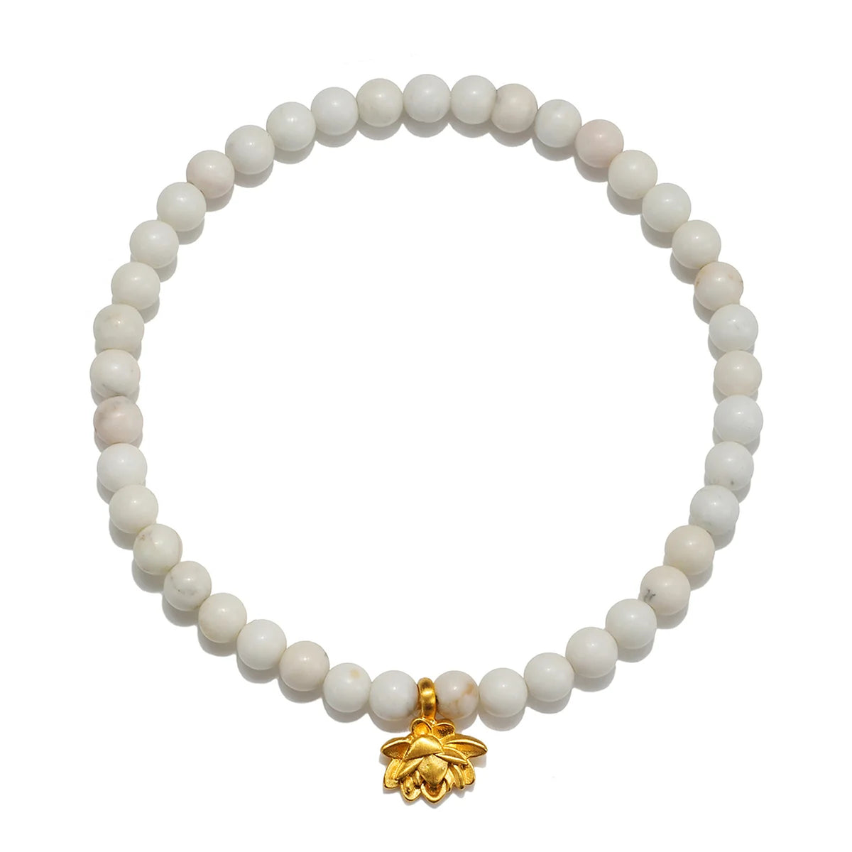A beaded stretch bracelet made of round off-white stone beads with a small gold bee charm at the bottom center, shown on a plain white background.