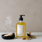 Bottle of Palo Santo with incense sticks and smoke on a neutral background