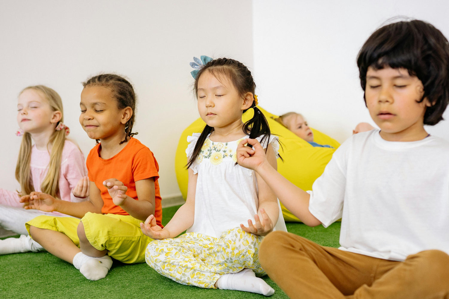 Children In Criss Cross Position With Closed Eyes by Yan Krukau