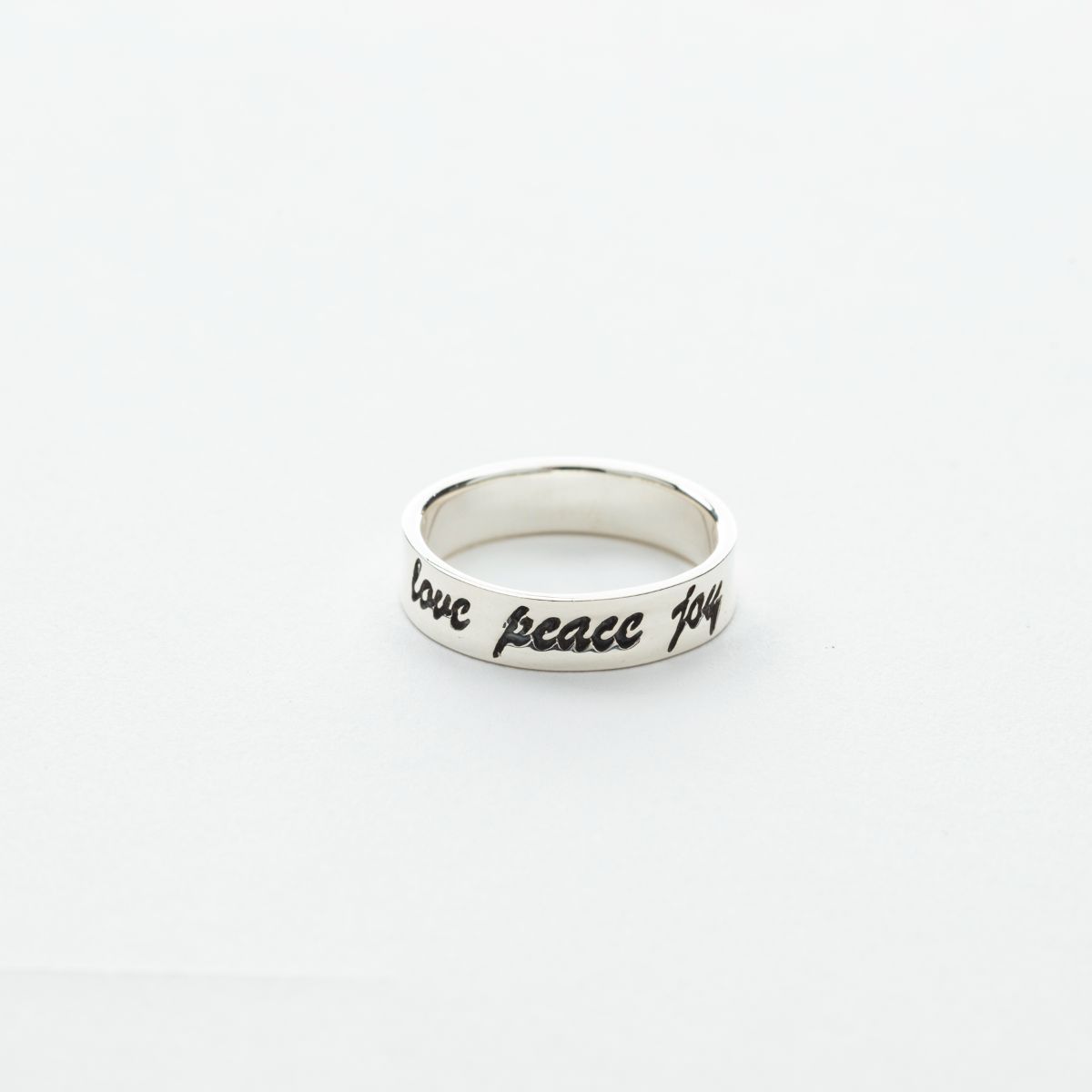 "Love, Peace, Joy" Script Wide Band Ring in Silver