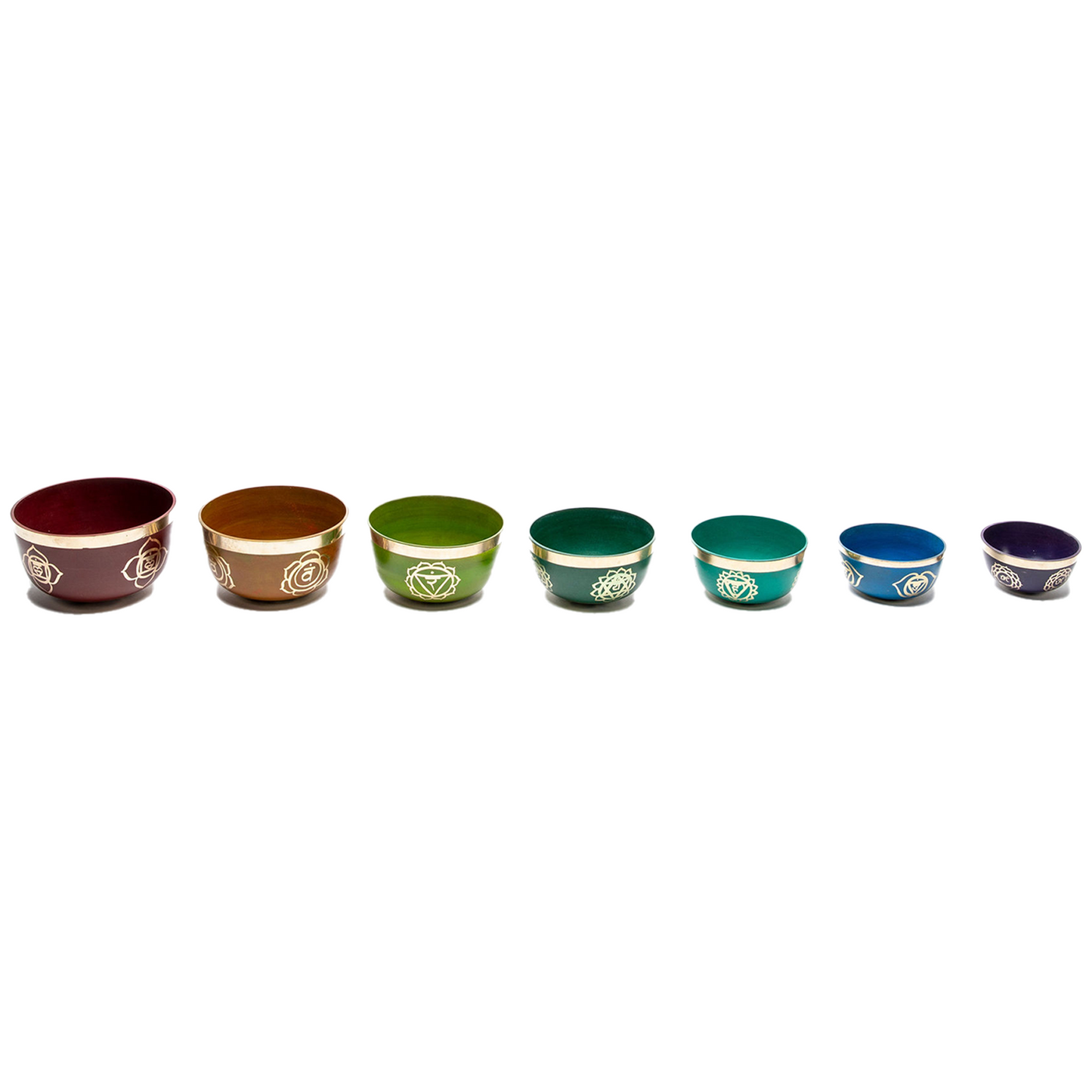 The Chakra 7 Bowl Set is lined up evenly against a solid white backdrop. It is a top/ side angle of the bowls that are lined from left to right, largest to smallest.