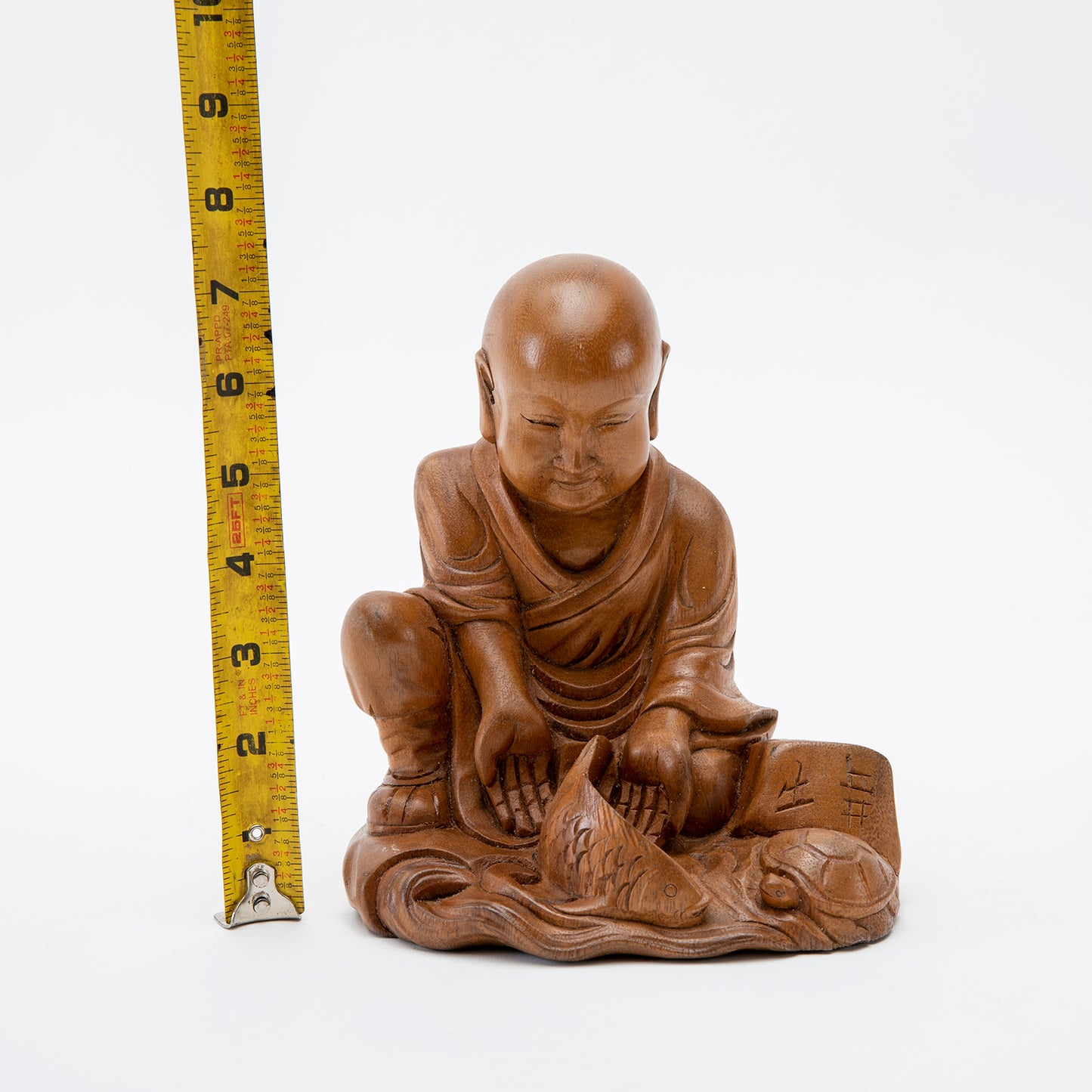 Wooden 'May All Beings Be Free' Statue